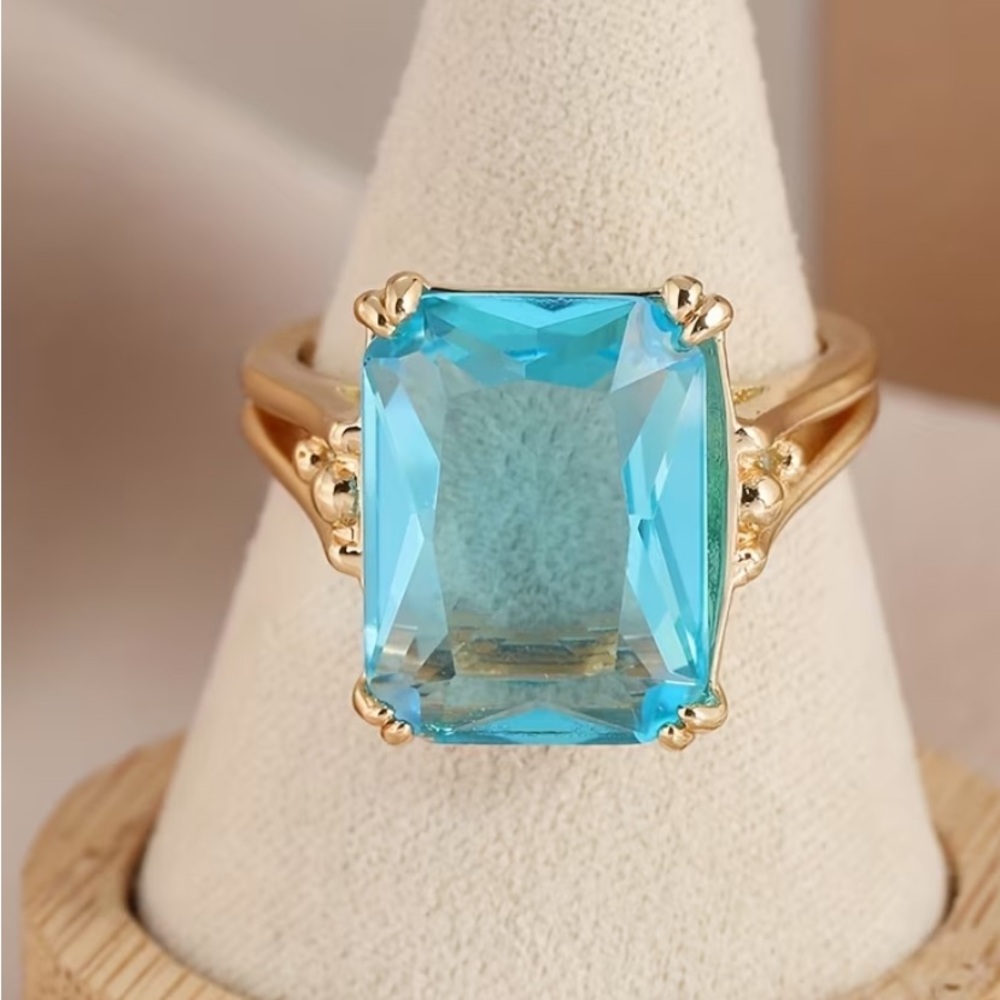 18k Gold Plated Ring with Vibrant Blue Aquamarine Emerald-Cut Stone - Picture 2 of 7